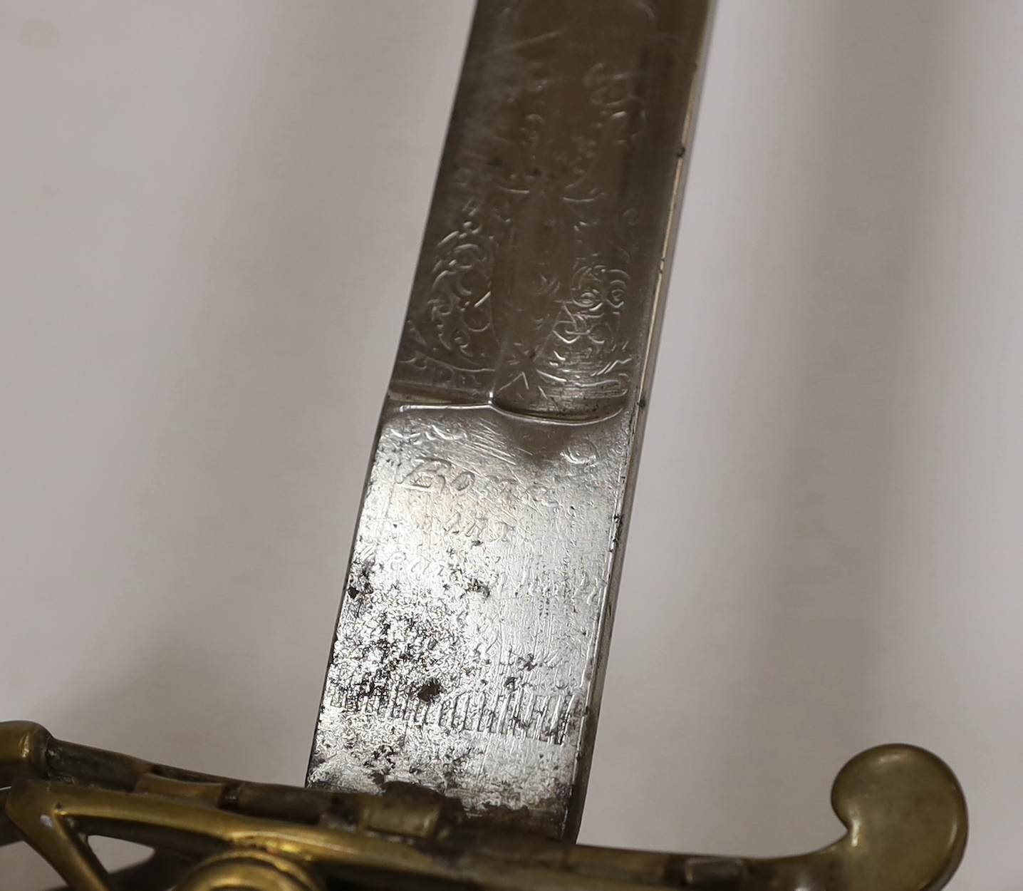 A scarce 1845 pattern infantry officer’s sword to the Penang Police, with regulation hilt, incomplete in its brass scabbard, blade 82cm